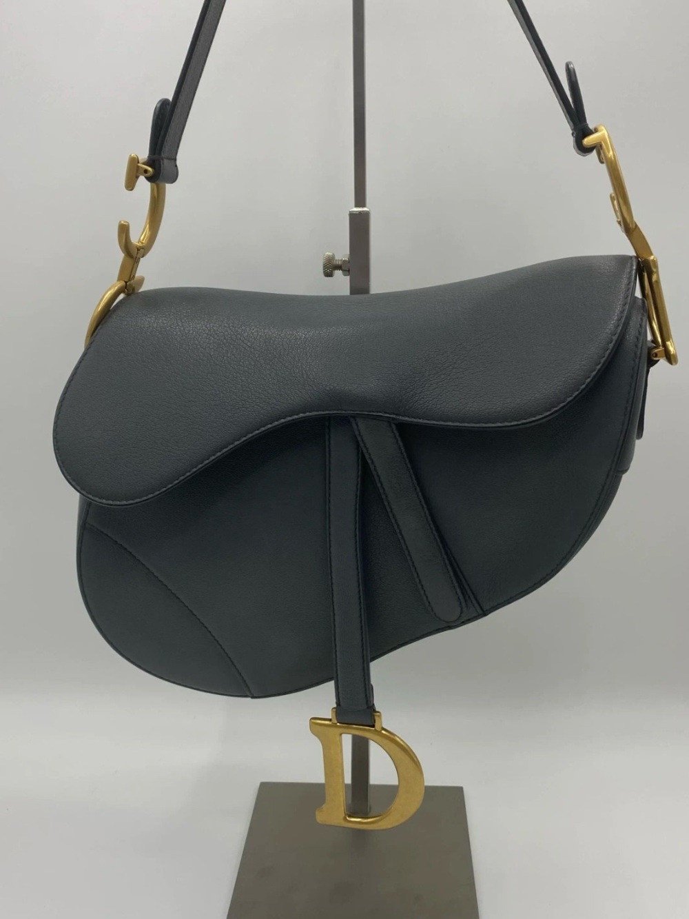 Dior Saddle medium in charcoal gray calfskin antique gold-tone hardware